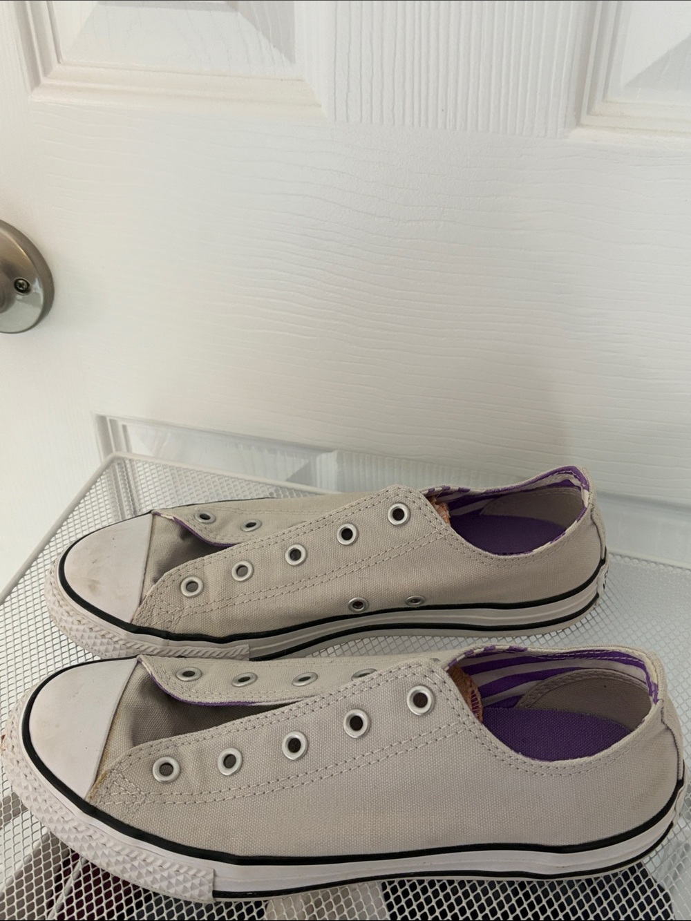 Converse Junior Slip-On Sneakers in White and Purple with Orange Stitching